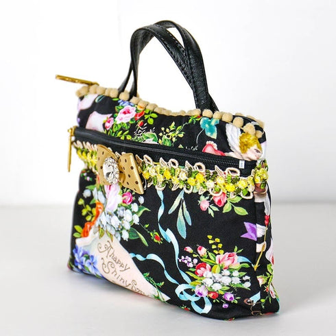 バッグ TUNIC エステルムースプリント シャイニーデイの手付きポーチ クロ 10152-B